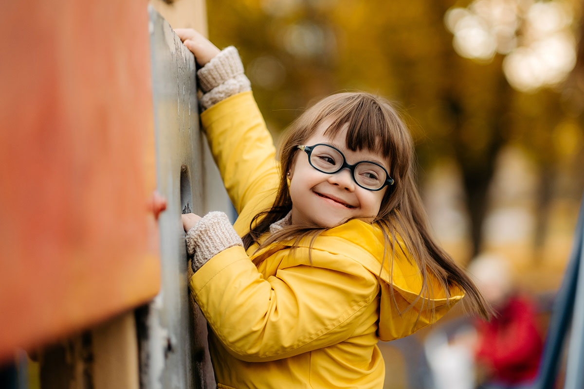 AdobeStock_548878838 a smiling child near a public park, symbolizing efficient citizen request management through C2 ITSM.